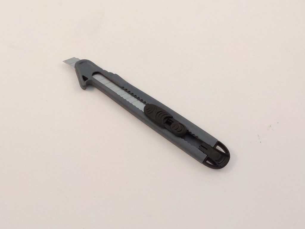 CUTTER GRIS CORTY - Caja Natural